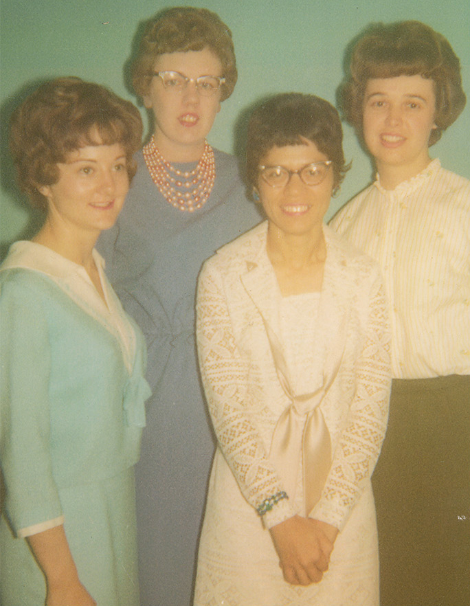 Joyce Cameron Foster, Director of the Maternal & Child Nursing program (now Nurse Midwifery), with the class of 1967.